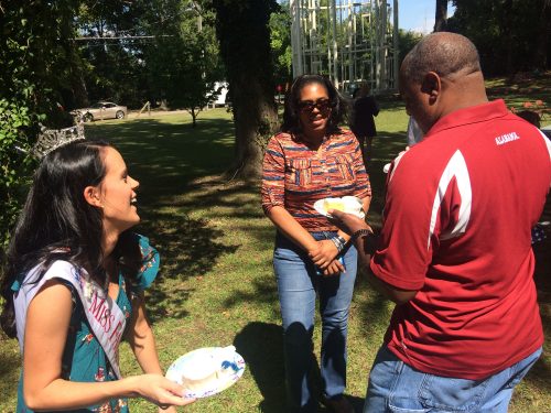 Crystal Byrd, this year’s Miss Fayetteville, volunteered during the Lafayette Birthday Celebration and shares a light moment here with guests at the birthday cake and ice cream party as part of Festival of Yesteryear at Arsenal Park. One of the day’s highlights was African Spirituals: Freedom Prayers, by a group called Life as Art Productions.