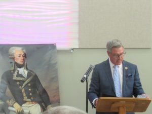 State Senator Kirk deViere reads a proclamation from NC governor Roy Cooper