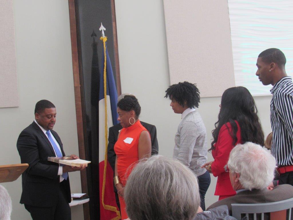 Fayetteville mayor Mitch Colvin makes a presentation to members of the Fayetteville State University Black History Scholars Association