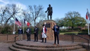 Lafayette Society President Hank Parfitt, County Commissioner Glenn Adams, Mayor Mitch Colvin, General Lafayette, and Julien Ischer h Colvin, and national Lafayette Trail organizer Julien Ischer standing in front of the Lafayette Statue in Cross Creek Park.