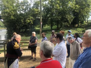 Bruce Daws (in uniform) speaks to participants in the Lafayette Trail Tour