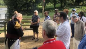 Bruce Daws of the FILI speaks to participants during a stop on the Lafayette Trail Tour
